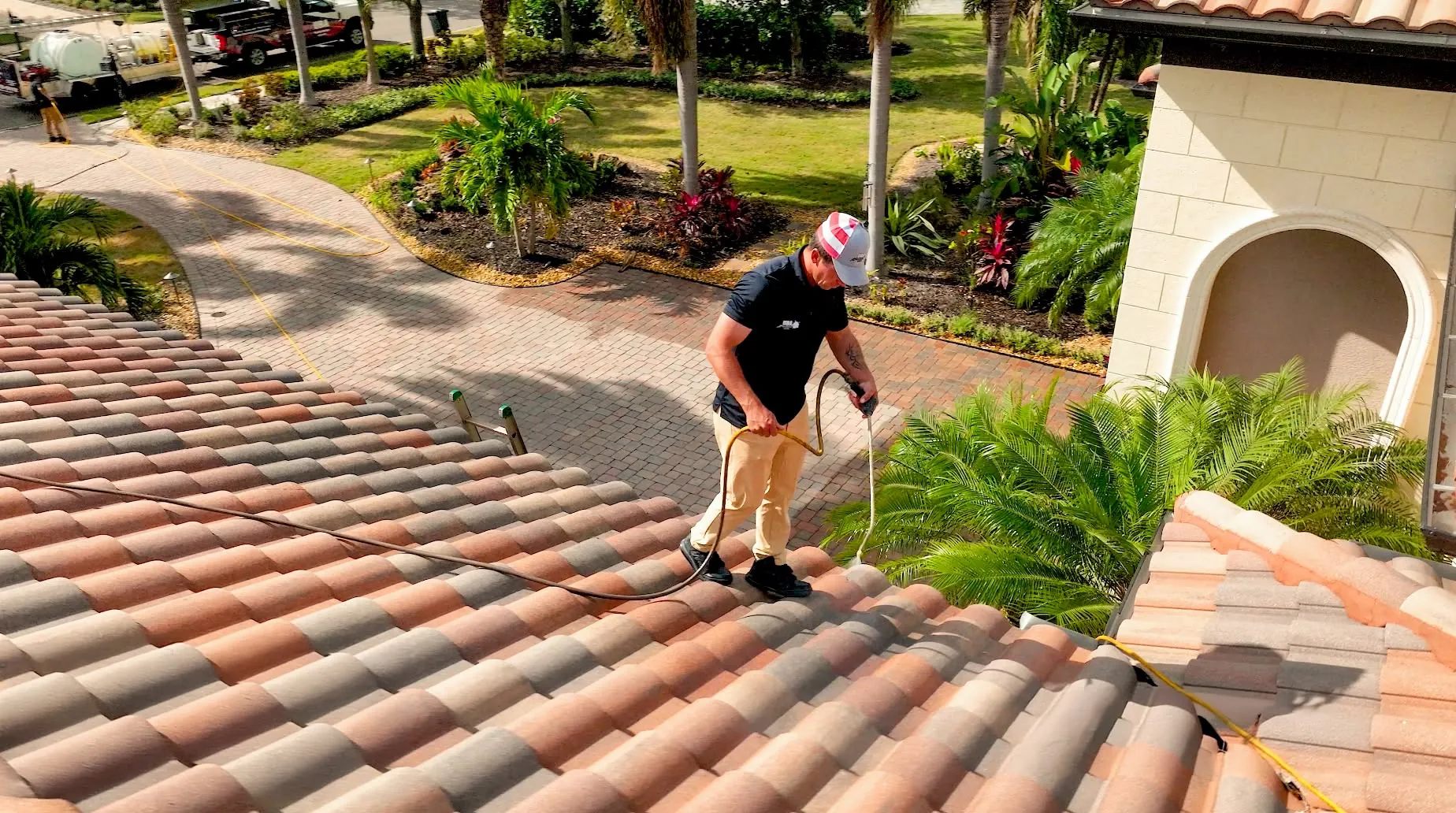 HydroLock sealer being applied to a Florida clay tile roof by a UBA technician