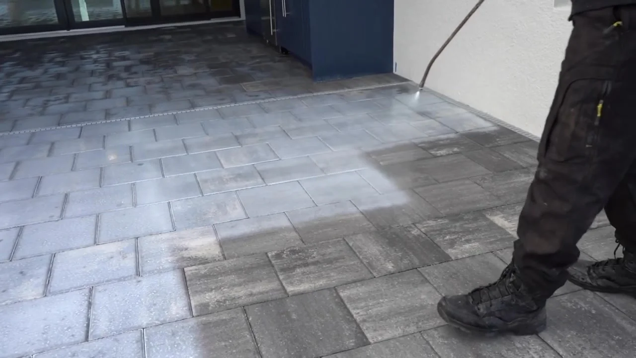Sealed pavers at a Sarasota home showing rich color and protective finish after UBA paver sealing
