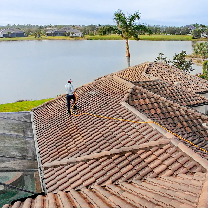 Roof soft washing on a Florida tile roof
