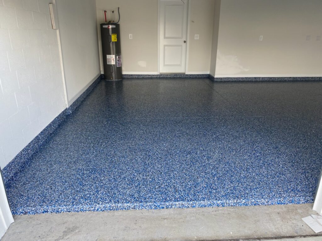 Blue heavy Deco flakes with base UBA Pressure Washing and Sealer 941-320-6172